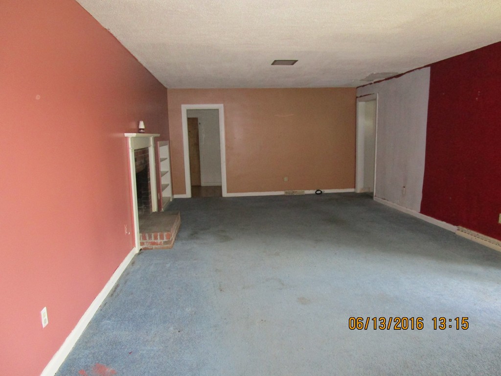 62 Worcester Road Westminster, MA 01473 - Photo 3 of 12 an empty room with a door