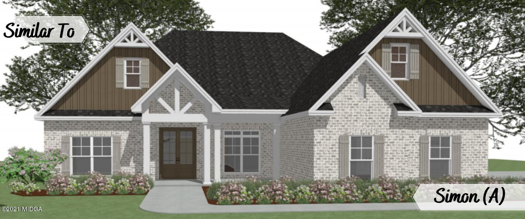 411 Stonegate Trail Perry, GA 31069 - Photo 1 of 14 a front view of a house with a yard