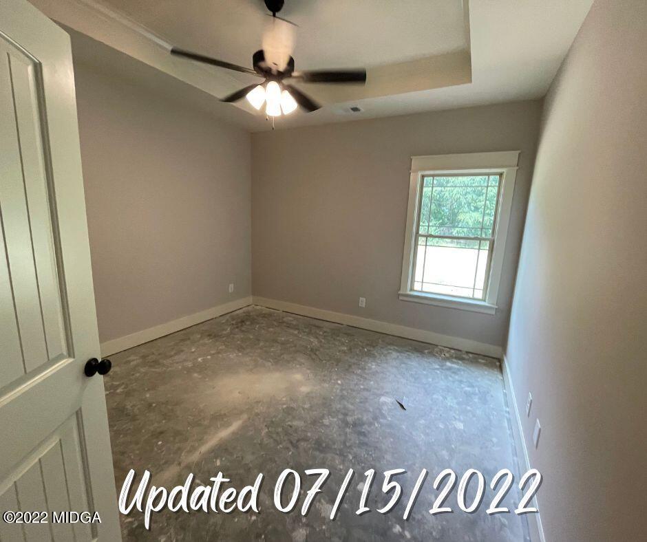 411 Stonegate Trail Perry, GA 31069 - Photo 14 of 14 an empty room with window