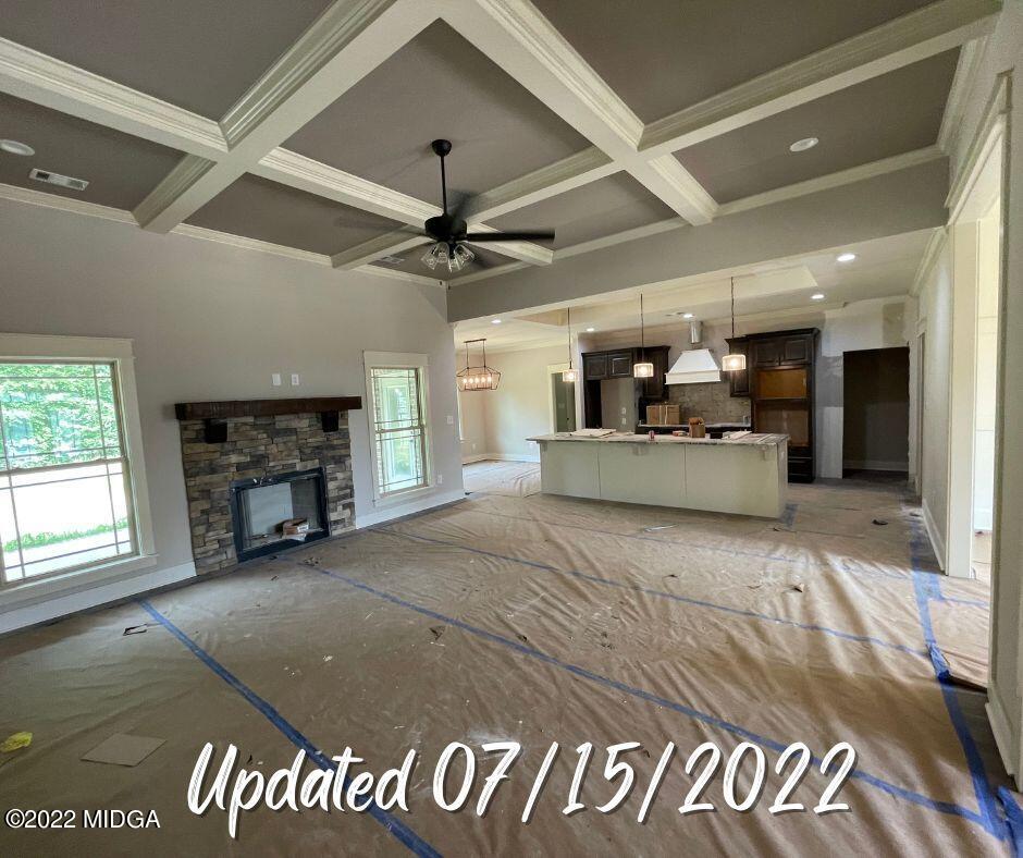 411 Stonegate Trail Perry, GA 31069 - Photo 4 of 14 a view of a livingroom with fireplace and window