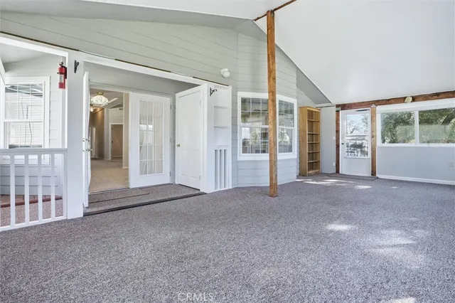 a view of empty room with windows