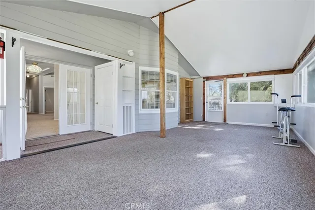 a view of a livingroom with furniture and windows