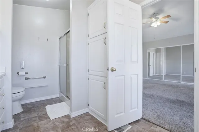 an empty room with a empty space and windows