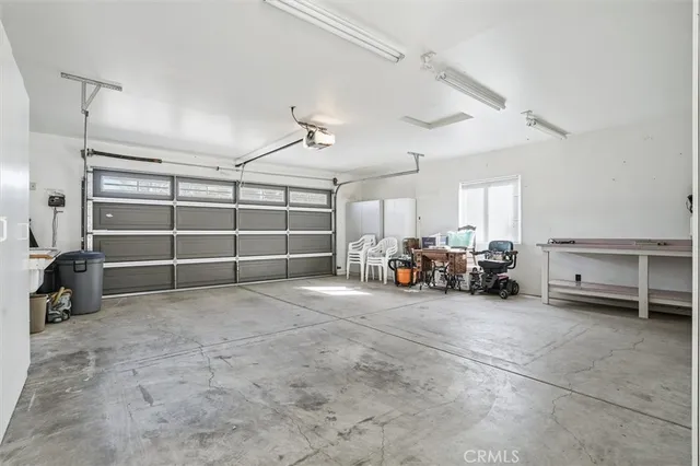 a view of a livingroom with closet and cabinet