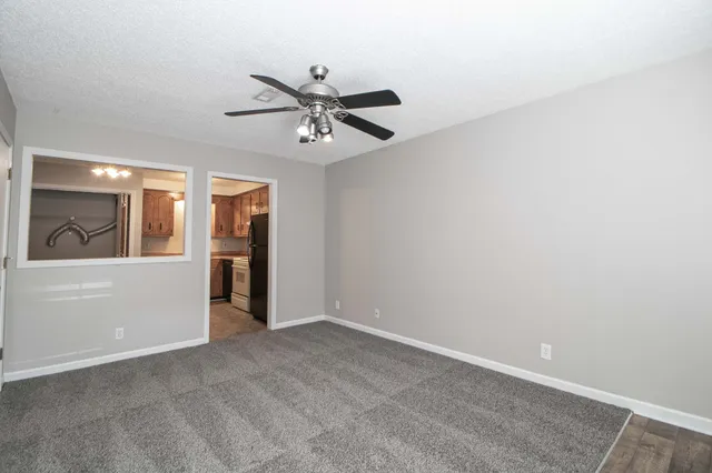 a view of an empty room with window