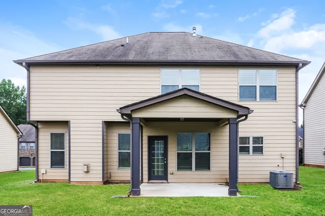 a view of a house with garden