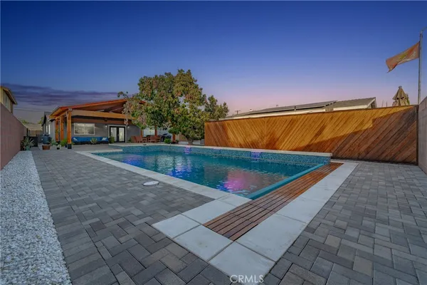a view of an outdoor space and swimming pool