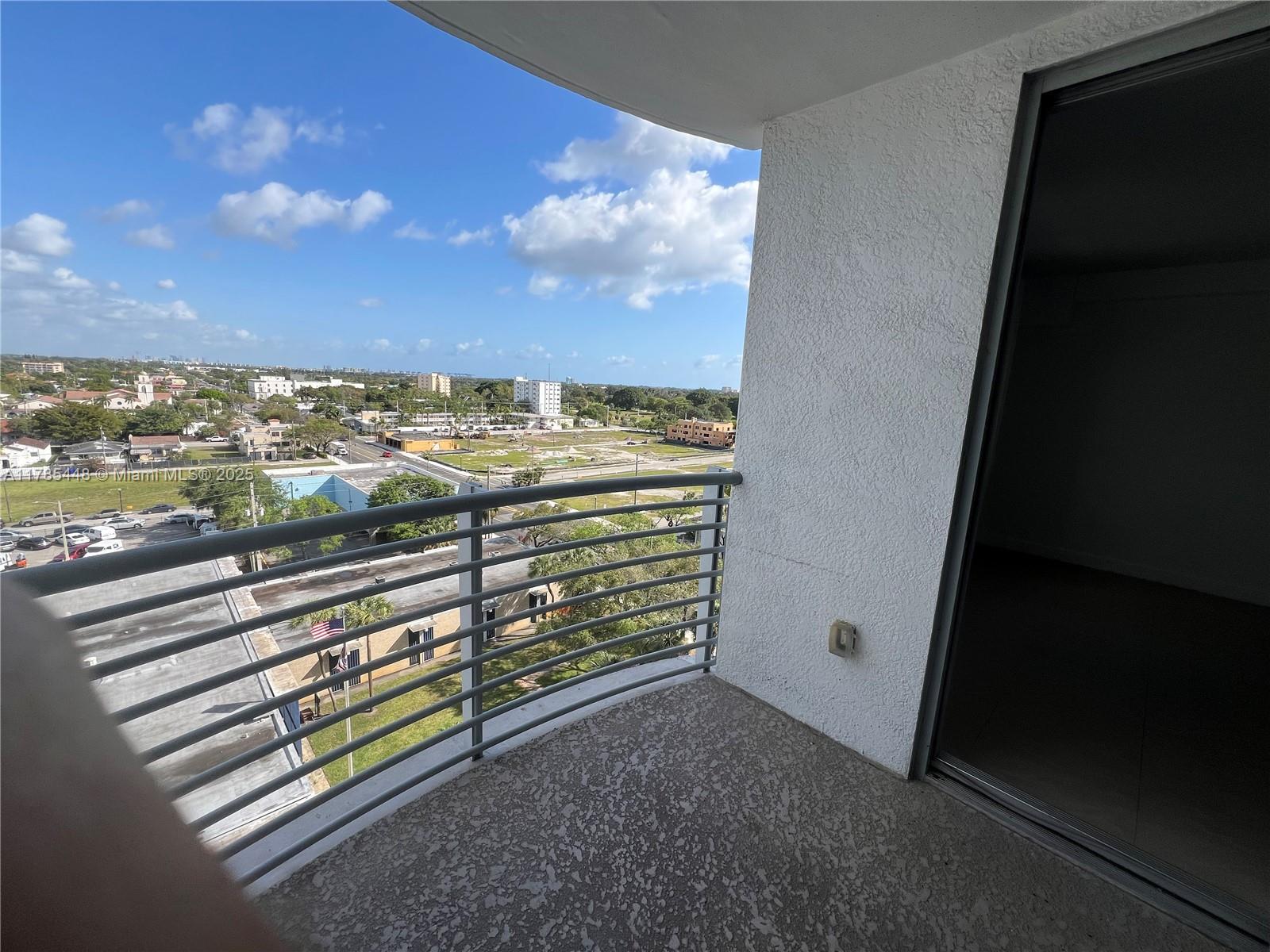 1830 Radius Drive, Unit 909 Hollywood, FL 33020 - Photo 14 of 22 a view of a balcony with an outdoor space