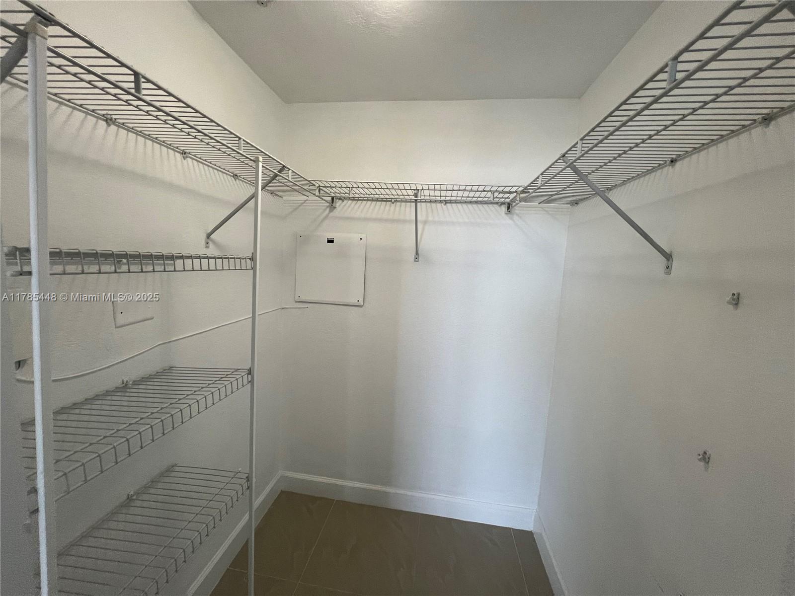 1830 Radius Drive, Unit 909 Hollywood, FL 33020 - Photo 8 of 22 a bathroom with a shower