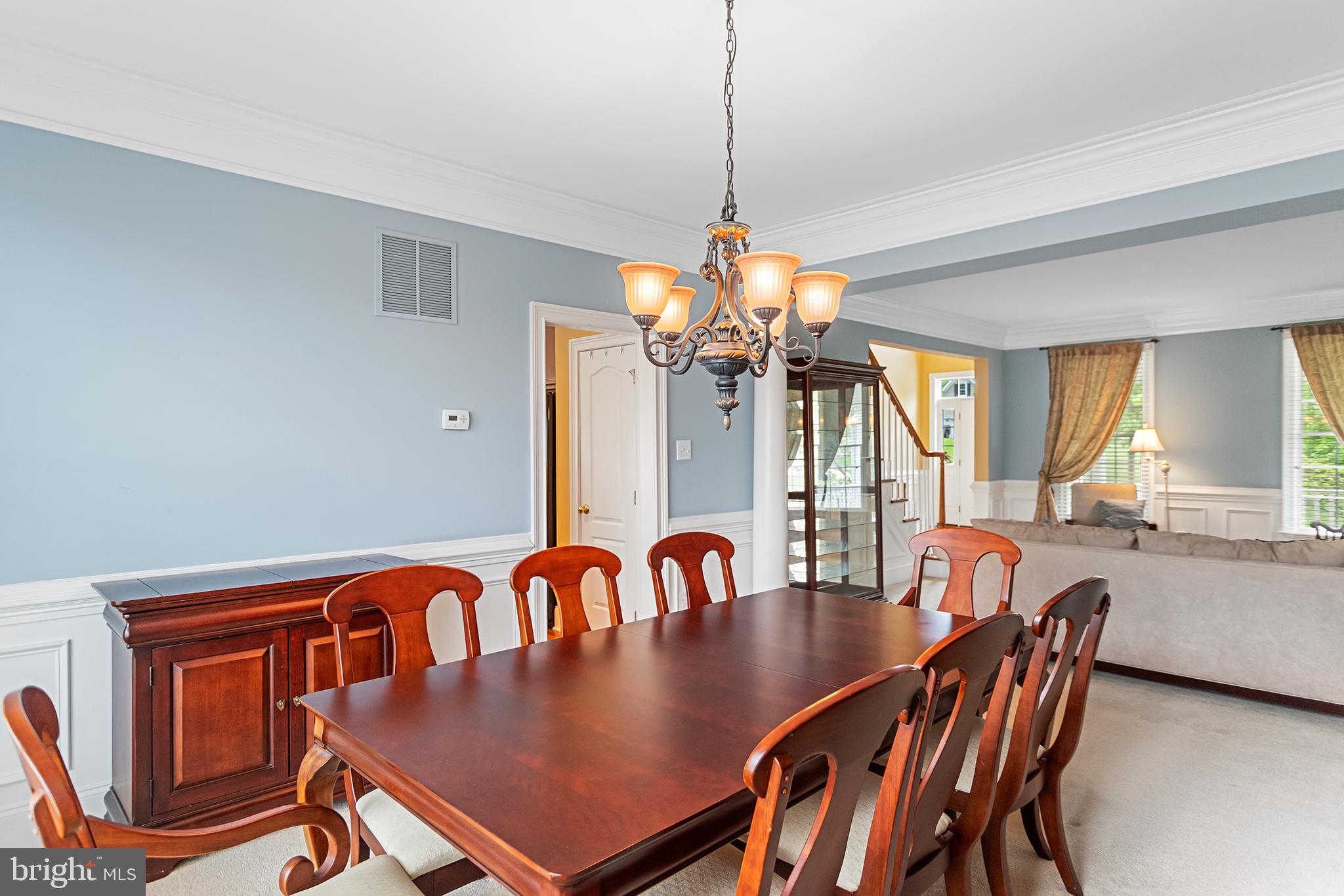 103 Sloan Road West Chester, PA 19382 - Photo 14 of 56 a view of a dining room with furniture window and wooden floor