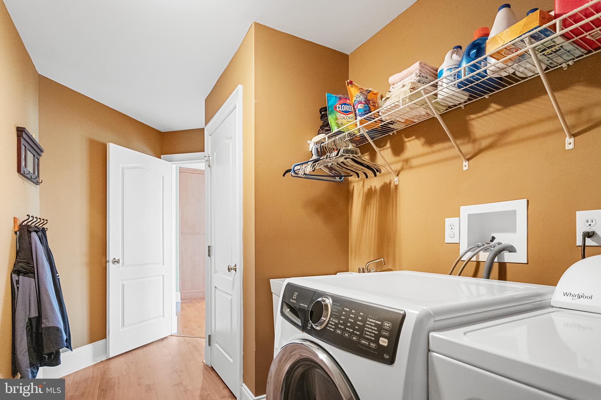 103 Sloan Road West Chester, PA 19382 - Photo 27 of 56 a view of a bedroom with washer and dryer