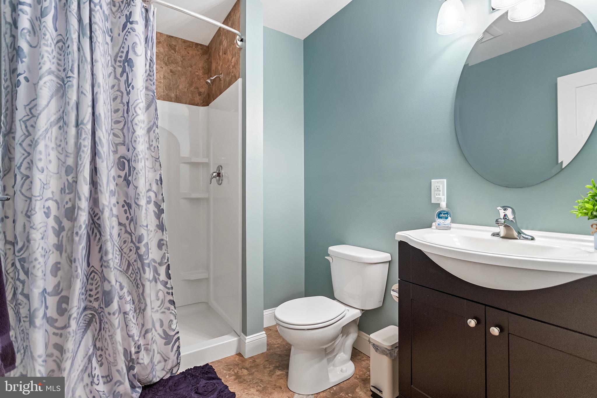 103 Sloan Road West Chester, PA 19382 - Photo 48 of 56 a bathroom with a sink toilet and shower
