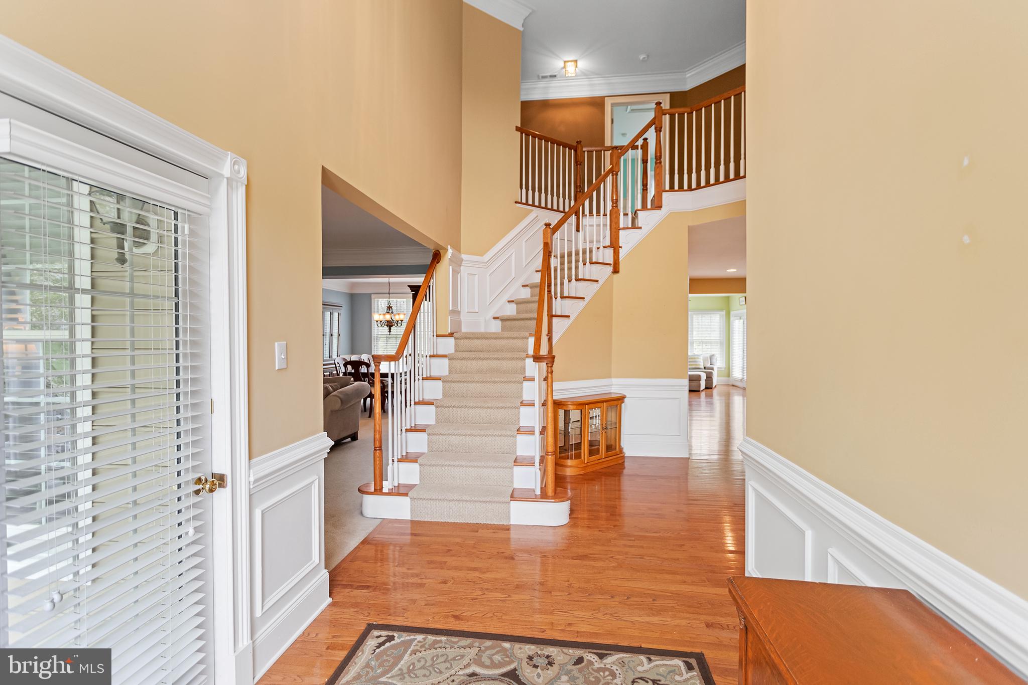 103 Sloan Road West Chester, PA 19382 - Photo 6 of 56 a view of entryway and hall with wooden floor