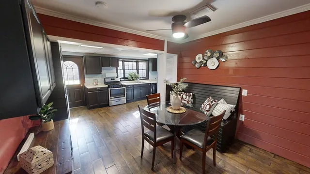 a view of room with window and ceiling fan