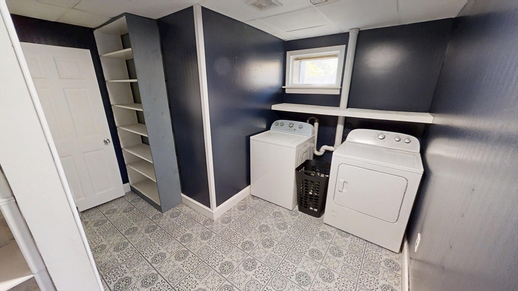 48 Pond Street Salem, NH 03079 - Photo 17 of 35 a view of a storage & utility room with washer and dryer