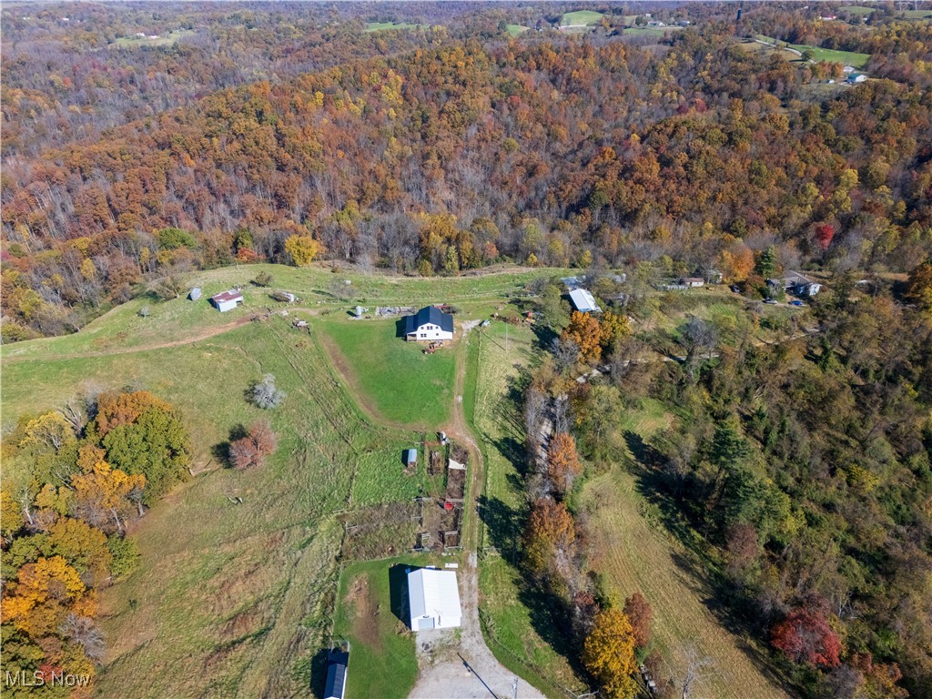 540 Wine Road Elizabeth, WV 26143 - Photo 35 of 49 Aerial overview of property's location featuring a heavily wooded area