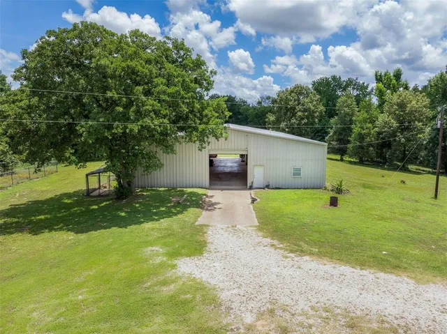 a house with a tree in front of it