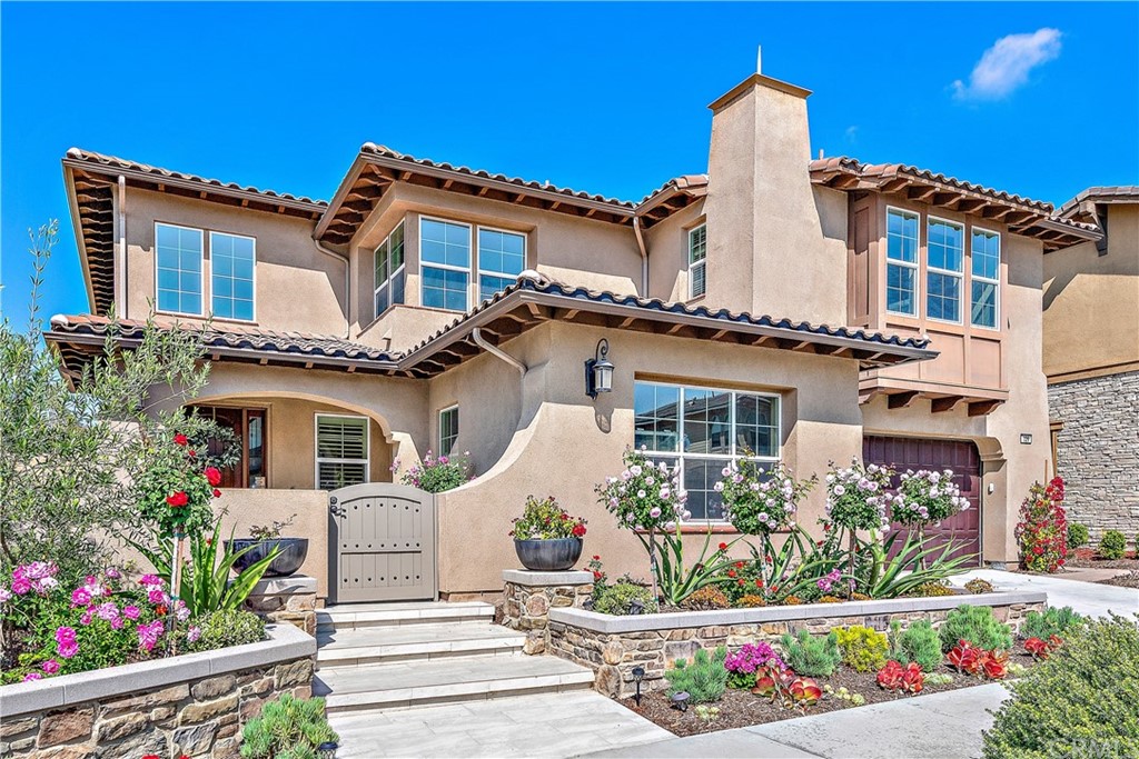 front view of a house with a bench