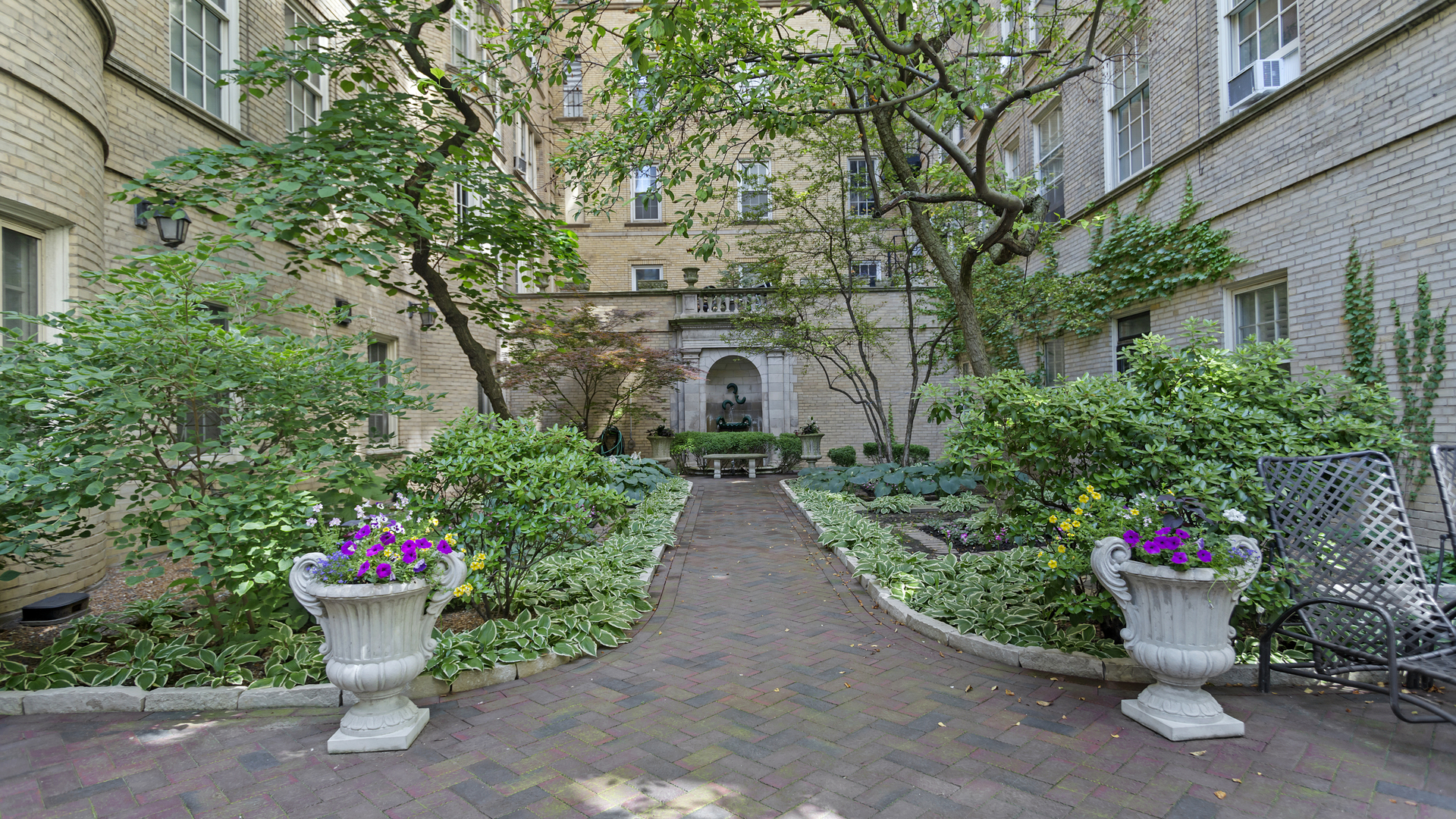 70 East Scott Street, Unit 908 Chicago, IL 60610 - Photo 3 of 15 a view of a garden with a flower garden