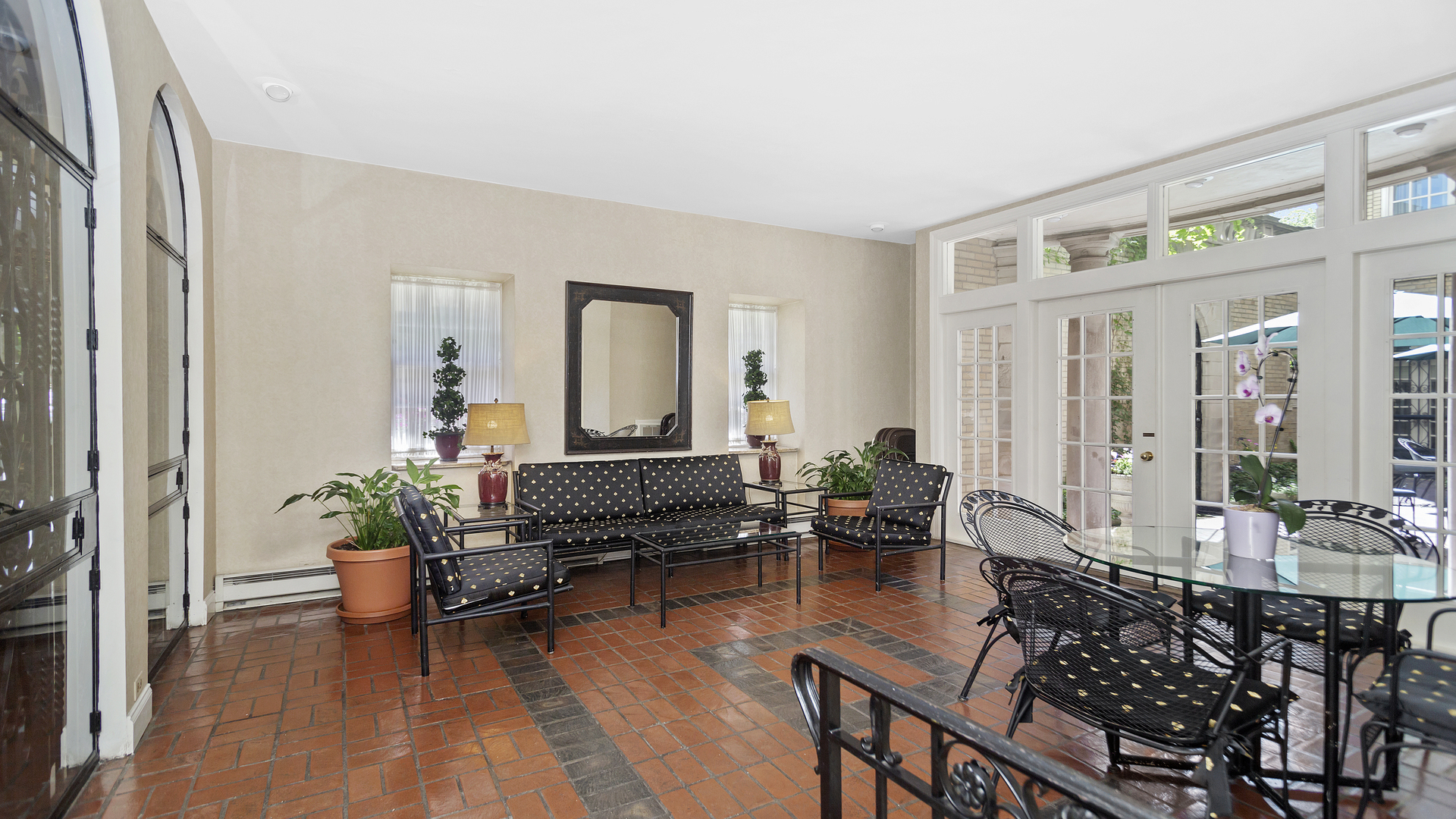 70 East Scott Street, Unit 908 Chicago, IL 60610 - Photo 6 of 15 a living room with furniture and wooden floor