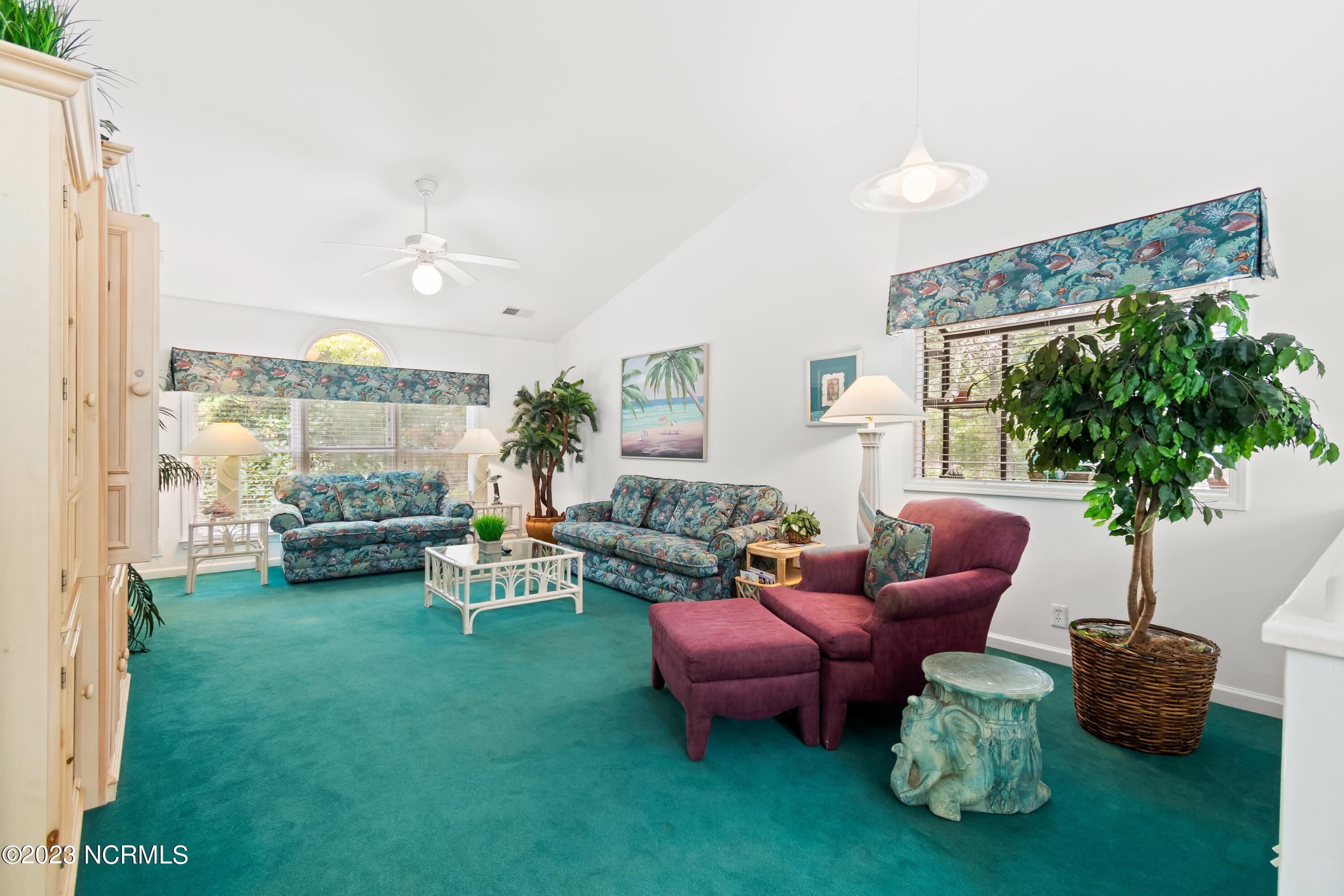 226 Clubhouse Road, Unit 17D Sunset Beach, NC 28468 - Photo 24 of 37 This cozy living area will be perfect for a game night or curling up with a new book.