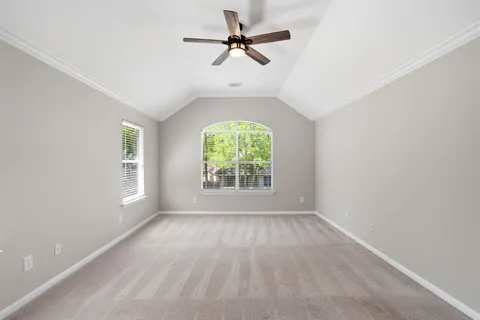 a spacious bathroom with a bathtub and a shower