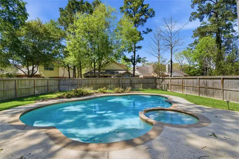 $435,000 | 31 Harmony Hollow Court, The Woodlands, TX 77385