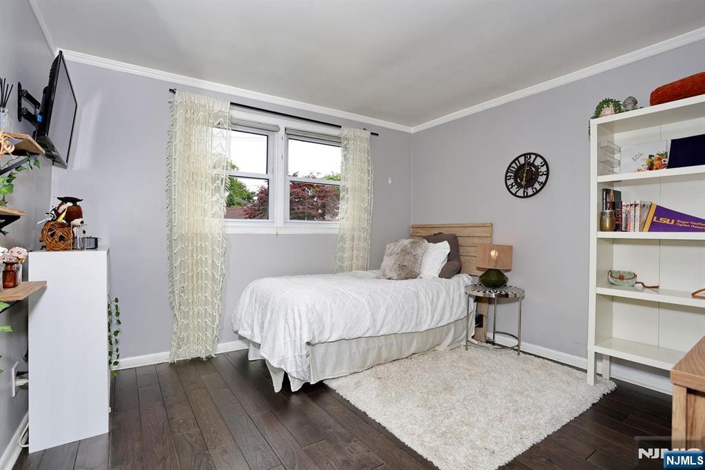30 Brookfield Road Dumont, NJ 07628 - Photo 20 of 50 a bedroom with a bed and a window