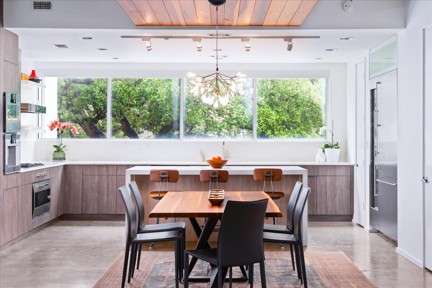 2301 South 5th Street, Unit 11 Austin, TX 78704 - Photo 6 of 24 This showpiece kitchen blends Italian craftsmanship with cutting-edge functionality in a sleek, minimalist design.