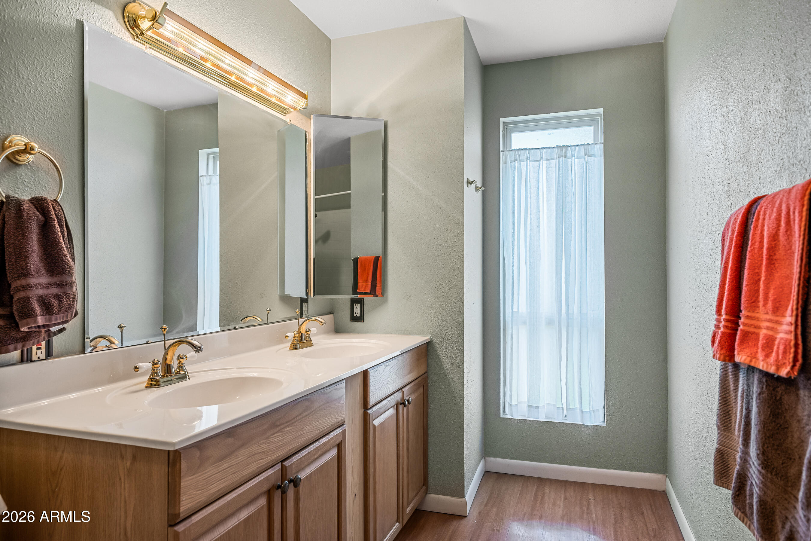 322 East Redfield Road Chandler, AZ 85225 - Photo 20 of 50 a bathroom with a sink vanity granite and a mirror