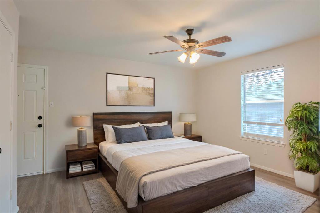 527 Crowley Road Arlington, TX 76012 - Photo 12 of 20 a bedroom with a bed and a window