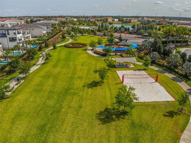 an aerial view of a pool patio swimming pool and outdoor seating