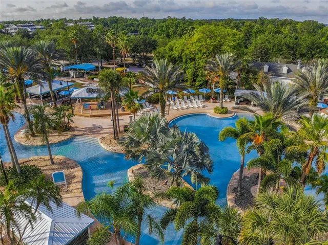 a view of a house with a yard porch and sitting area