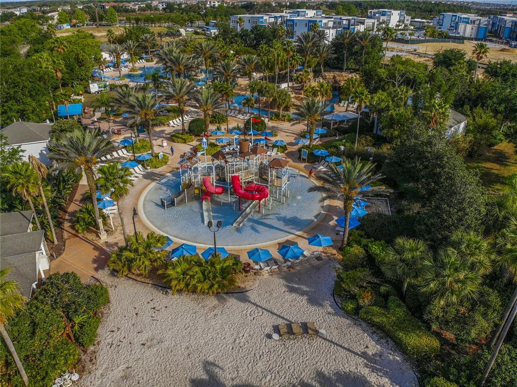8031 Twin Eagles Loop Reunion, FL 34747 - Photo 25 of 38 an aerial view of a house with a yard and lake view