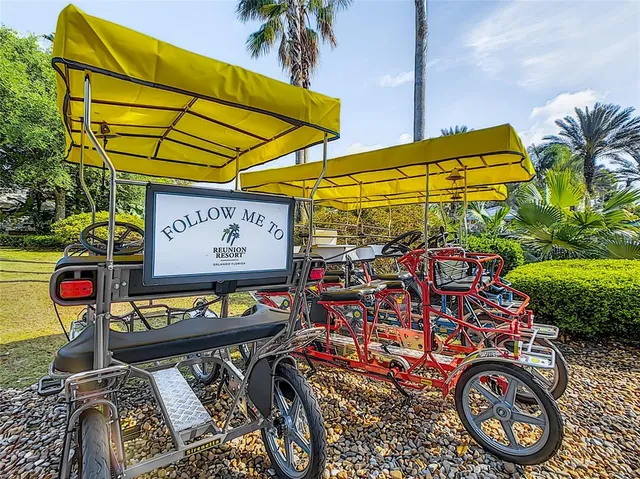 an outdoor space with furniture and umbrella