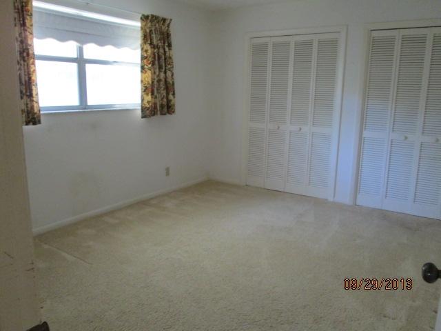 1236 Northwest 16th Street Boca Raton, FL 33486 - Photo 13 of 17 an empty room with windows
