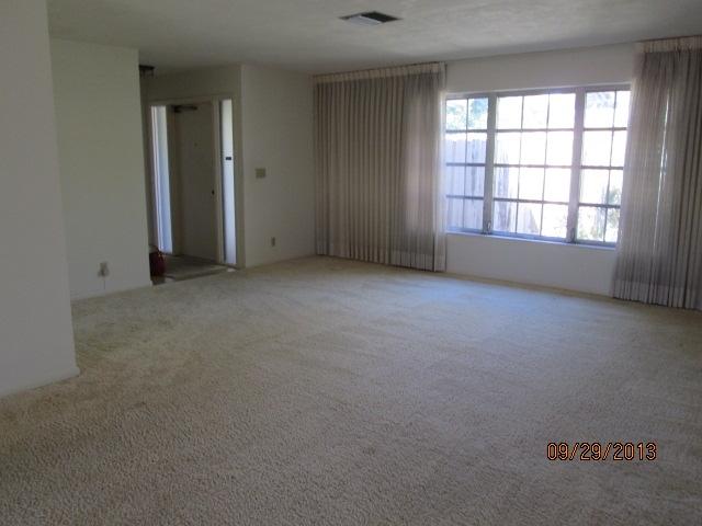 1236 Northwest 16th Street Boca Raton, FL 33486 - Photo 4 of 17 an empty room with windows and closet