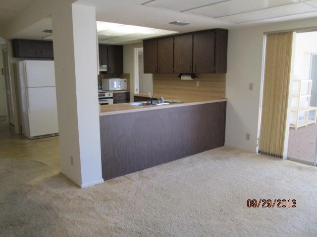 1236 Northwest 16th Street Boca Raton, FL 33486 - Photo 7 of 17 a view of kitchen and utility room
