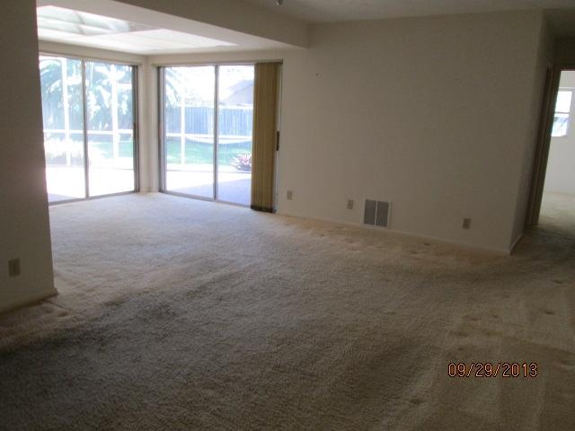 1236 Northwest 16th Street Boca Raton, FL 33486 - Photo 9 of 17 a view of empty room with floor to ceiling window