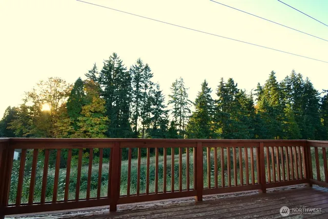a view of a wooden fence