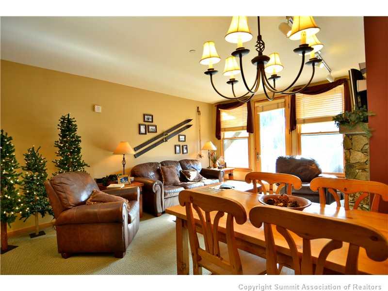 195 River Run Road, Unit 8043 Keystone, CO 80435 - Photo 4 of 25 a living room with furniture and a large window