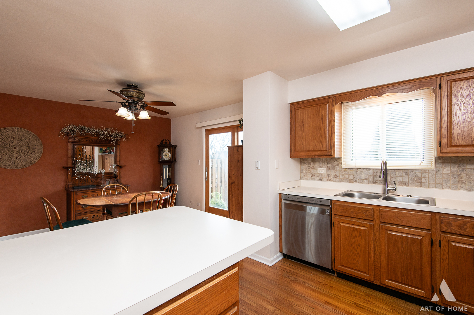 552 Stone Gate Circle, Unit 552 Schaumburg, IL 60193 - Photo 11 of 34 a bedroom with a large bed and a chandelier