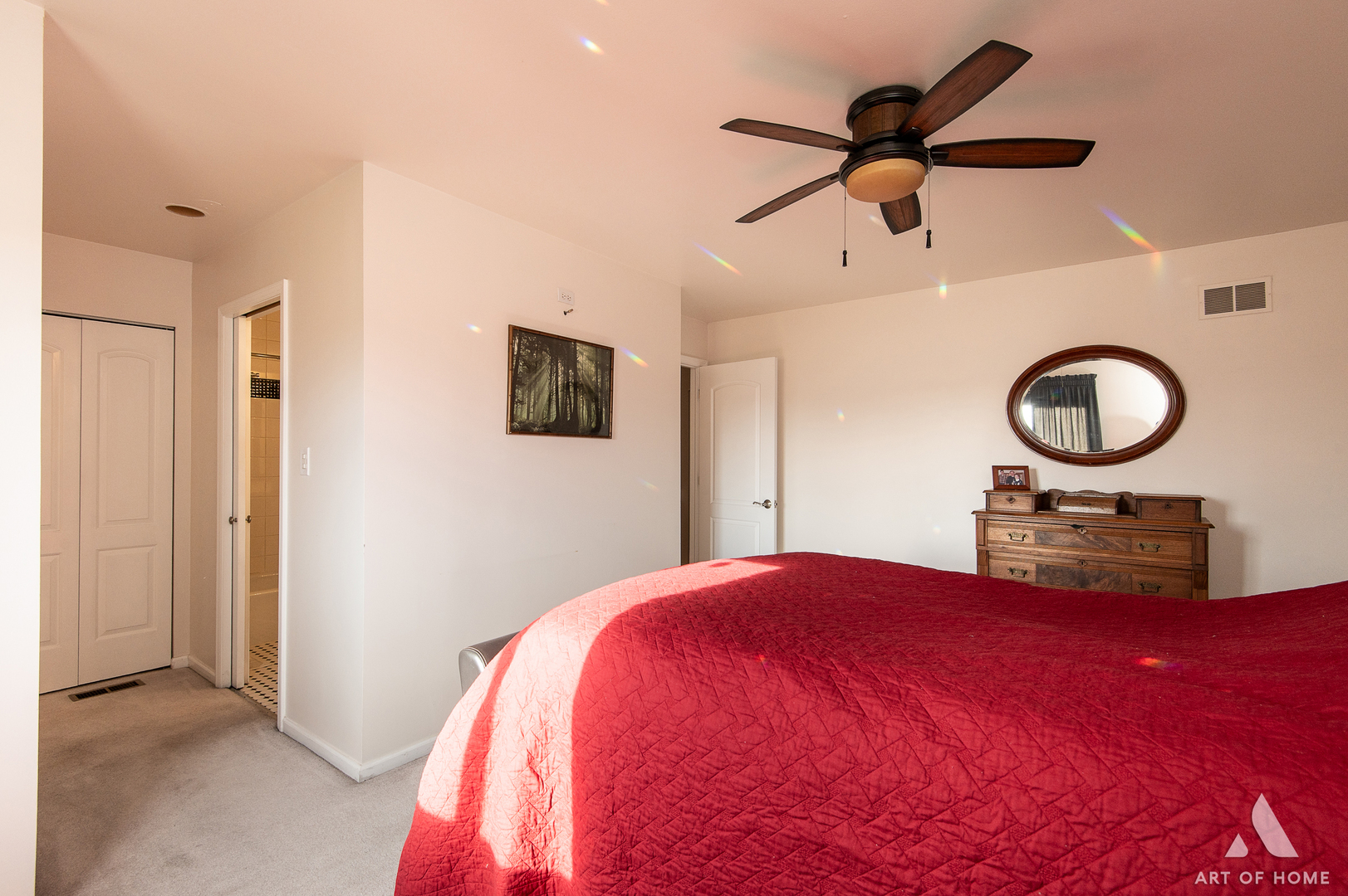 552 Stone Gate Circle, Unit 552 Schaumburg, IL 60193 - Photo 19 of 34 a bedroom with a bed and a chandelier