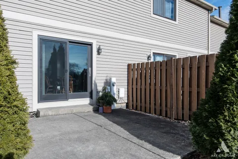 a view of potted plants in front of door