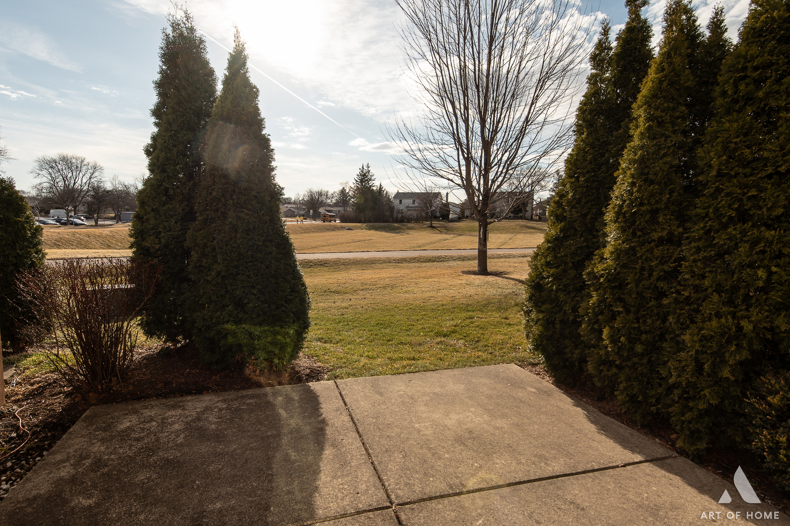 552 Stone Gate Circle, Unit 552 Schaumburg, IL 60193 - Photo 31 of 34 a view of a yard with wooden fence