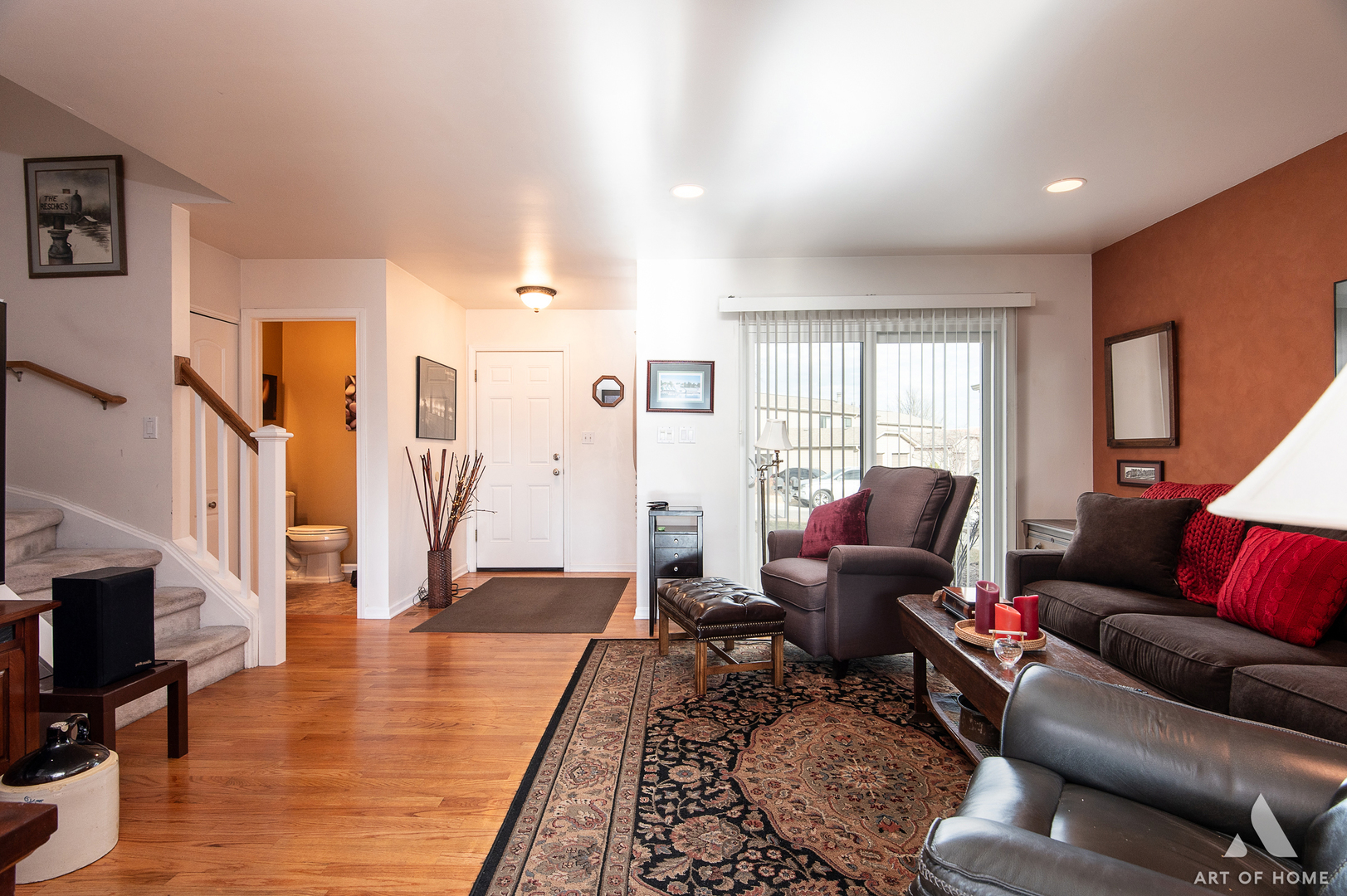 552 Stone Gate Circle, Unit 552 Schaumburg, IL 60193 - Photo 6 of 34 a living room with furniture and a fireplace