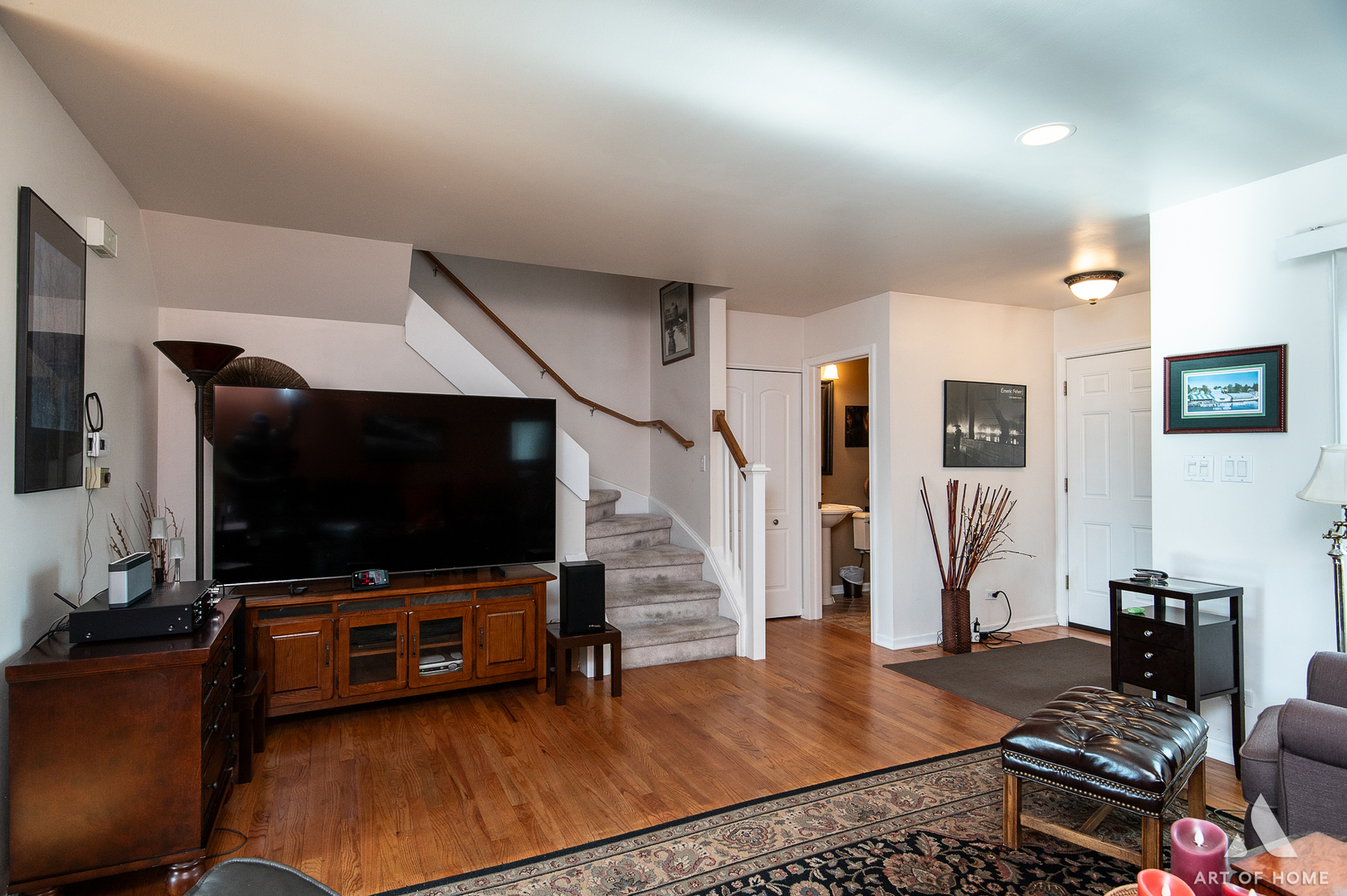 552 Stone Gate Circle, Unit 552 Schaumburg, IL 60193 - Photo 7 of 34 a living room with furniture and a flat screen tv