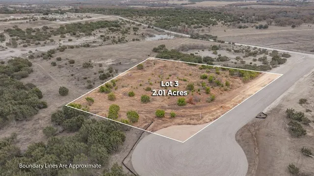 a view of a road with a yard