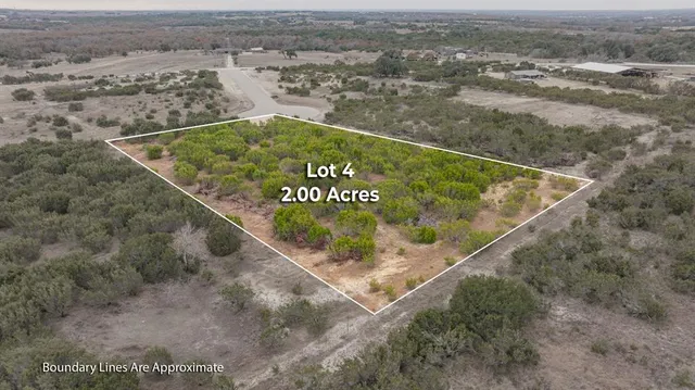 a view of a yard with a street