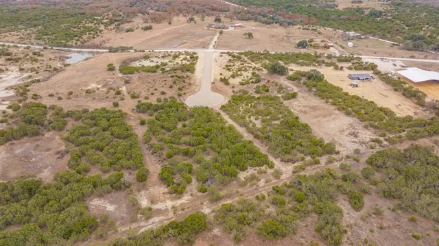 a view of swimming pool with a yard